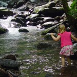 child at stream